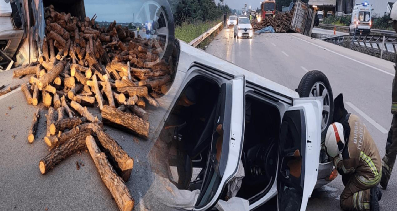 Dökülen tomruklara çarpan otomobil takla attı